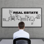 Real Estate Scheme On Desk